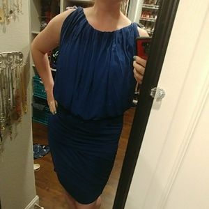 Blue body con drapey dress